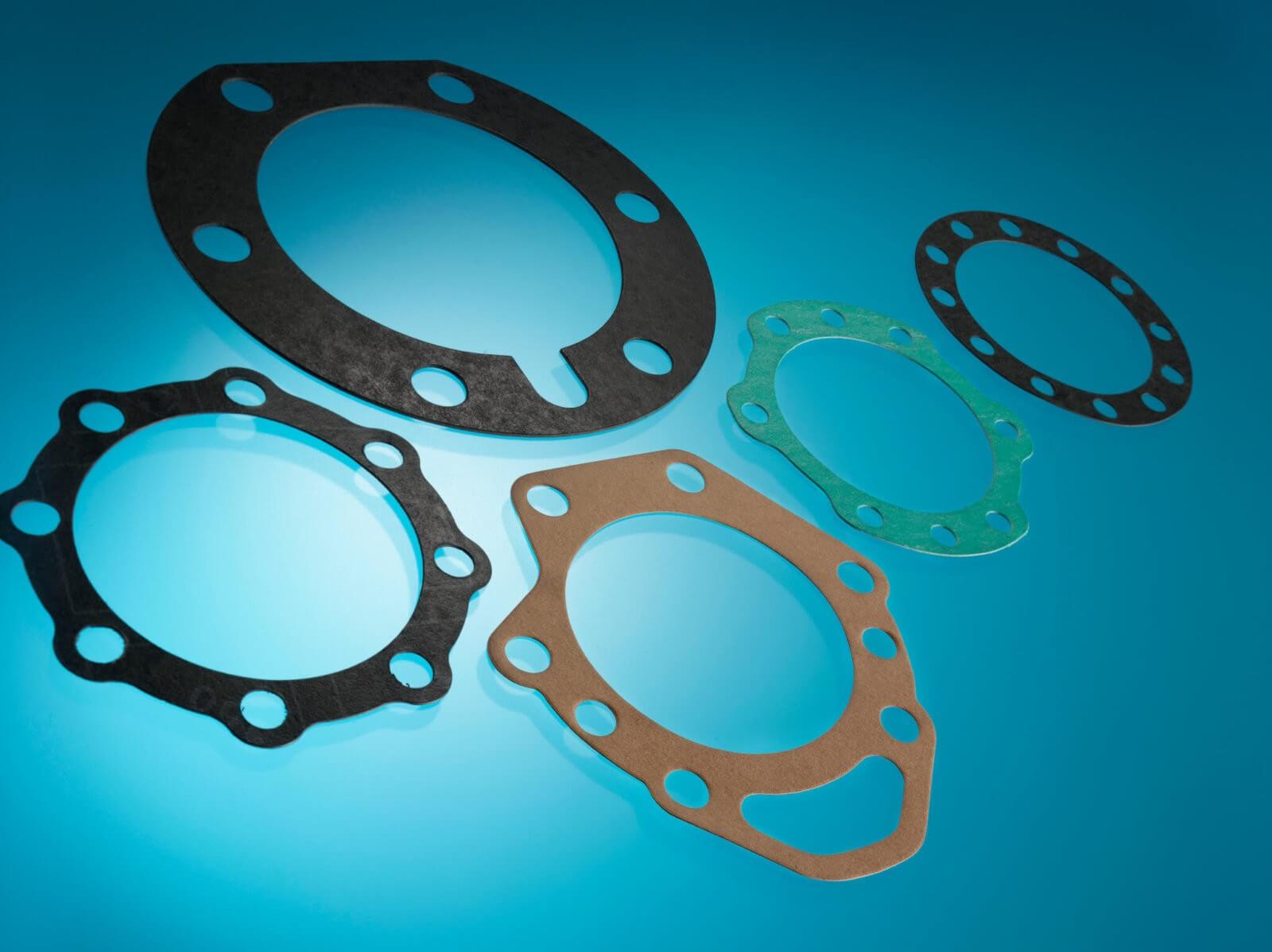 Automotive Parts Gasket. Gaskets made in Metal, Cellulose Pape, Composite, Shim Steel materials.