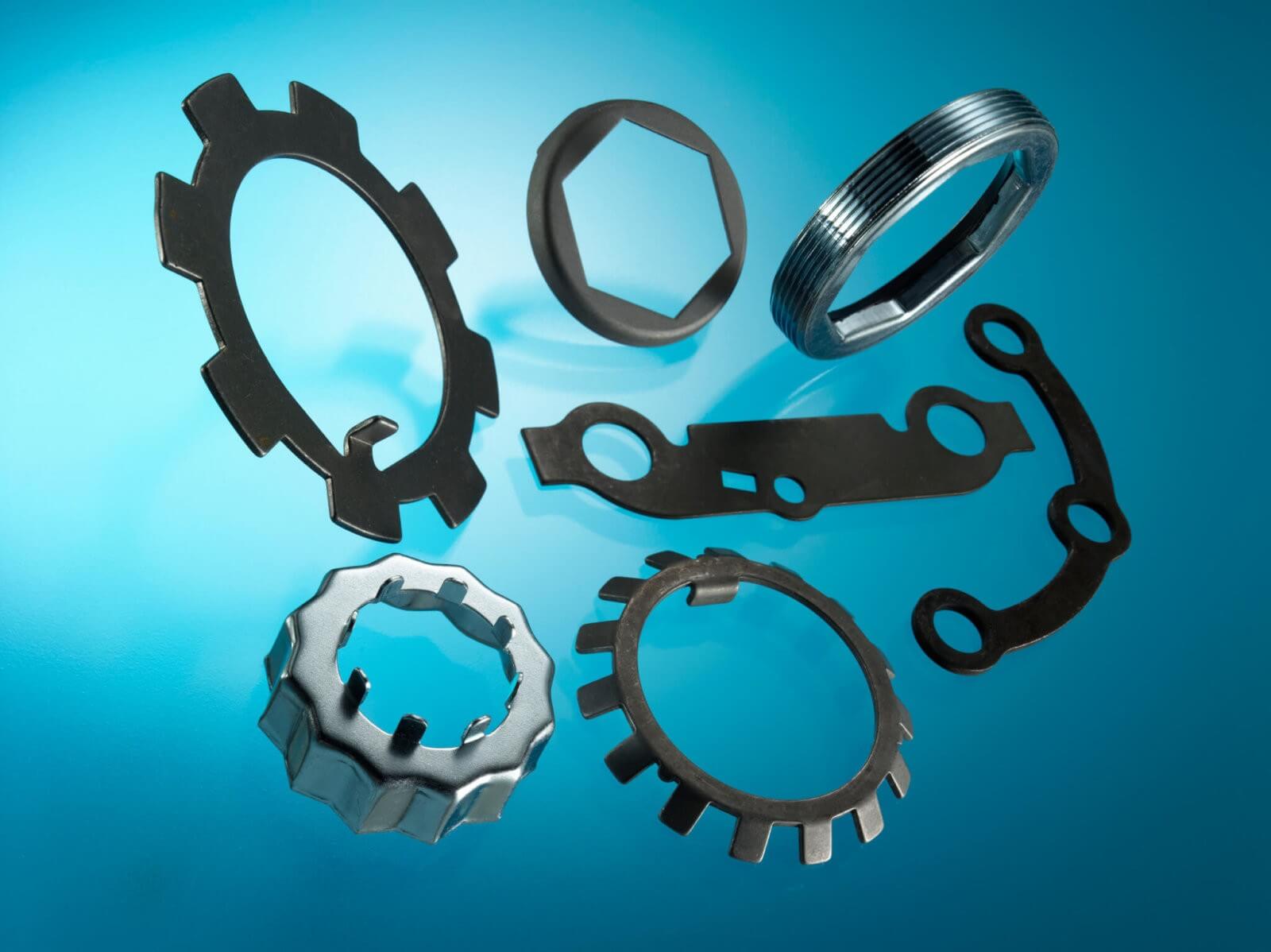 Automotive Parts Pressing Fixings. Gaskets made in Metal, Cellulose Pape, Composite, Shim Steel materials.