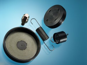 Automotive Parts Spring. Compression springs associated shields and protectors.